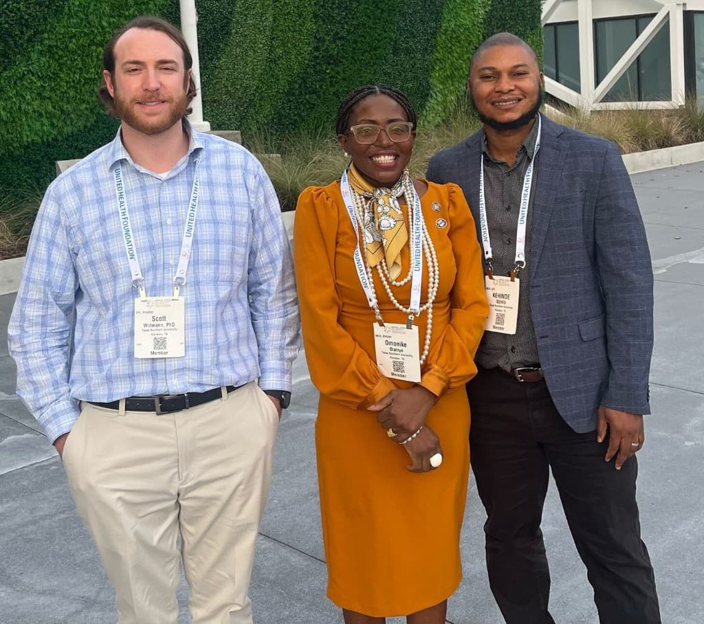 Dr. Scott Widmann, Dr. Esther Olaleye, and Dr. Kehinde Idowu together at APHA 2023